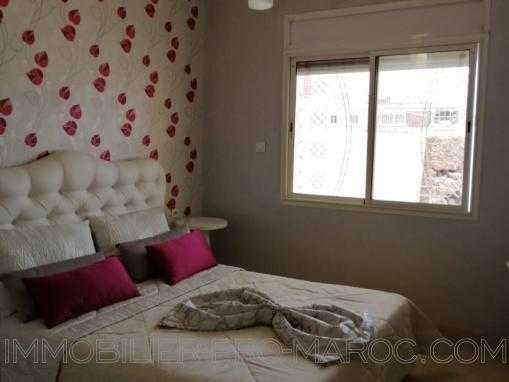 APPARTEMENT RDC AVEC GRANDE COUR